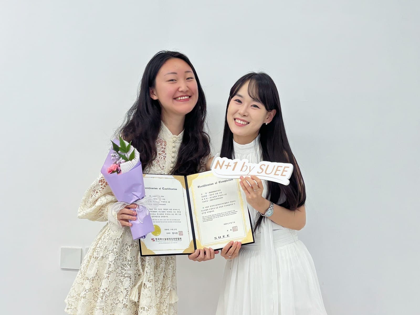 Shanshan holding her personal color consultant certification